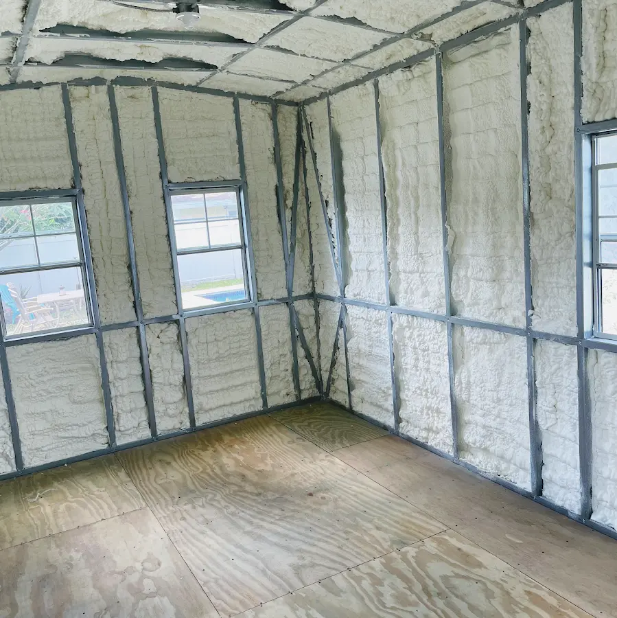 Closed-cell spray foam insulation applied to wall cavities in a residential project in Pharr